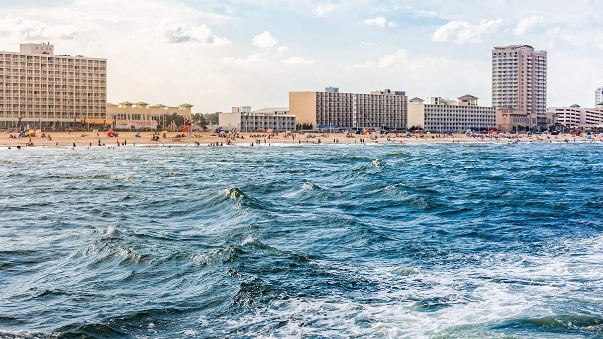 view of Virginia Beach from ocean with crowd of people Virginia Beach, Virginia, USA